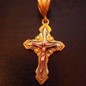 14K Gold Imprinted on the back. It weighs 11.5 grams. Could use some TLC.